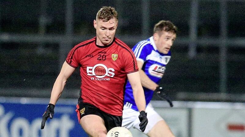 Down&#39;s Caolan Mooney races away from Gareth Dillon of Laois in the Allianz Football League Division 3 clash at Pairc Esler on January 26 2019. Picture by Philip Walsh. 