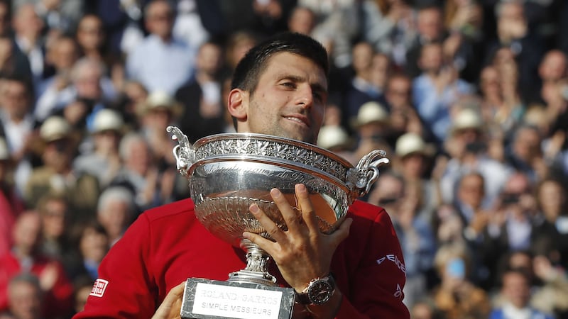 Serbia's Novak Djokovic with the French Open trophy at Roland Garros in Paris on Sunday<br />Picture by AP