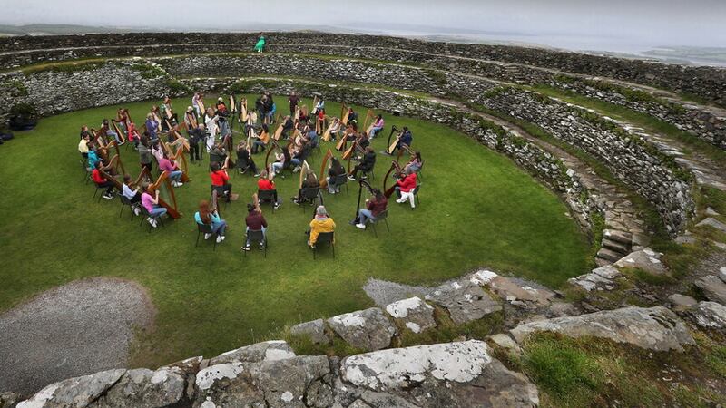 Harpers from across Ulster as well as County Louth gathered at the ancient Celtic hill fort of Grianán of Aileach in Inishowen to promote this year's Irish Harp Day. Picture by Margaret McLaughlin