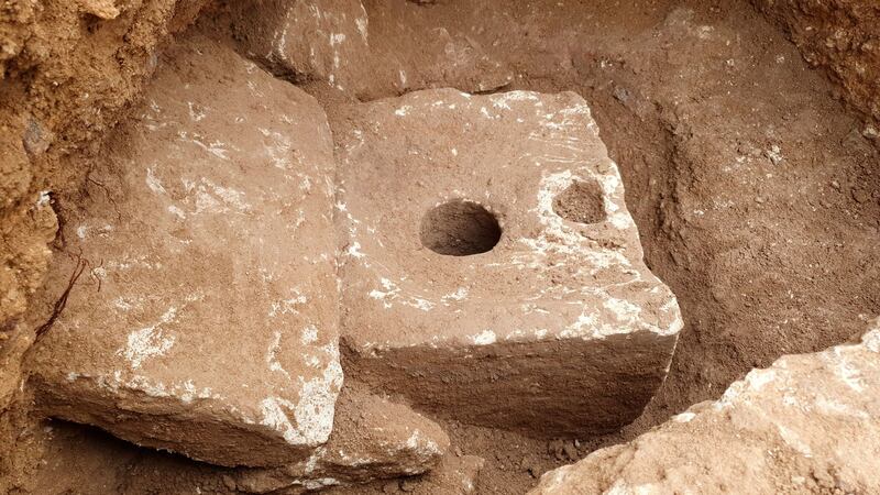 The carved limestone toilet was found in a cabin that was part of a sprawling mansion overlooking what is now the Old City.