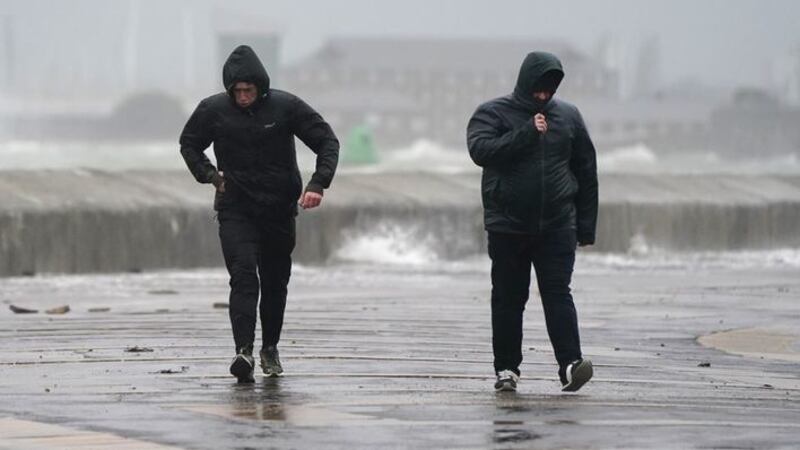 &nbsp;People brave the weather as they make their way along the sea front in Southsea as Storm Barra hit the UK and Ireland with disruptive winds, heavy rain and snow on Tuesday. Picture date: Tuesday December 7, 2021.