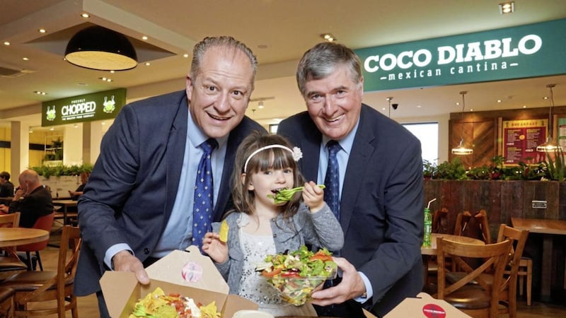 Brian Carlin (left), director of commercial development at Belfast International Airport, with Mount Charles chairman Trevor Annon and his grand-daughter Faye Annon 