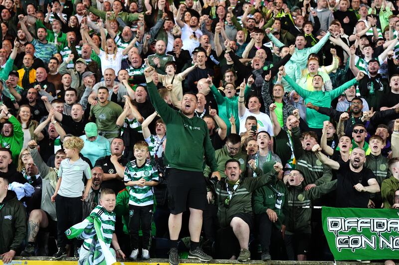 Celtic fans celebrate in the stands