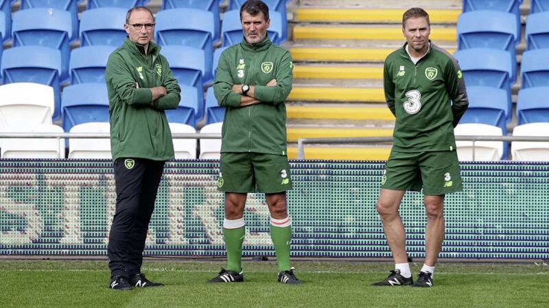 Republic of Ireland manager Martin O&#39;Neill (left), assistant manager Roy Keane and coach Steve Guppy (right) during the press conference at Cardiff City Stadium. O&#39;Neill has been forced to defend Keane on more than one occasion 