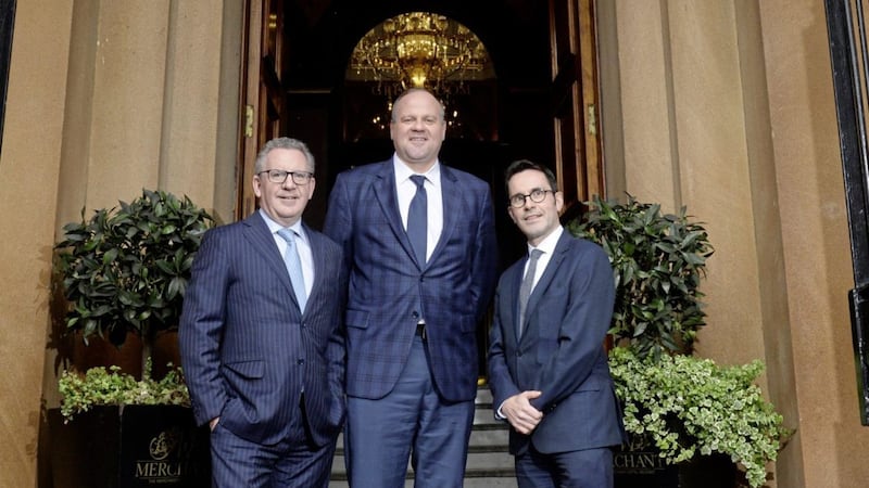 Mark O'Connell, chief executive of OCO Global pictured in Belfast with Maryland trade official Brian Castleberry and Adrian O&rsquo;Connell from Tughans