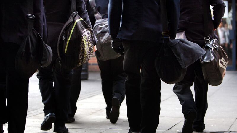 In recognition of the pressures facing schools, the requirement for a 32.5-hour week has been pushed back to 2024 (David Jones/PA)