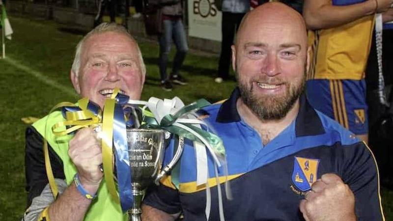 St Paul&#39;s team coach Paddy Hannigan and manager Peadar Heffron celebrate victory 