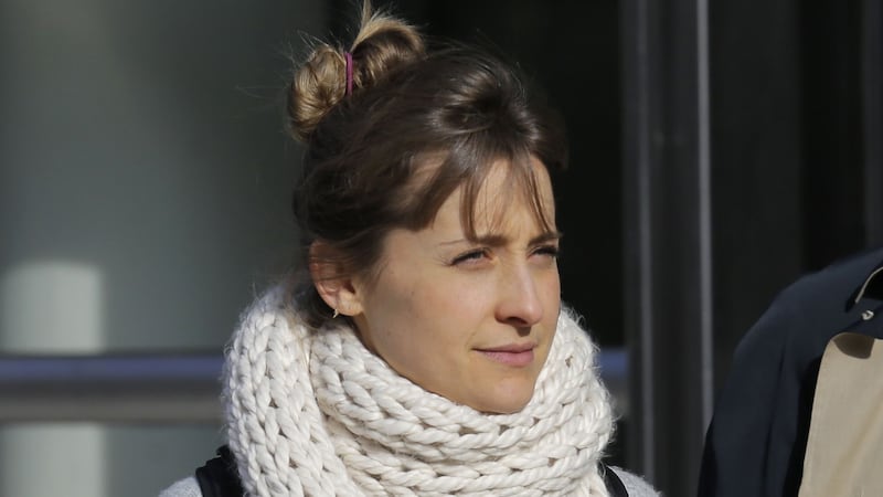 Allison Mack wept as she admitted her crimes in a federal court in Brooklyn.