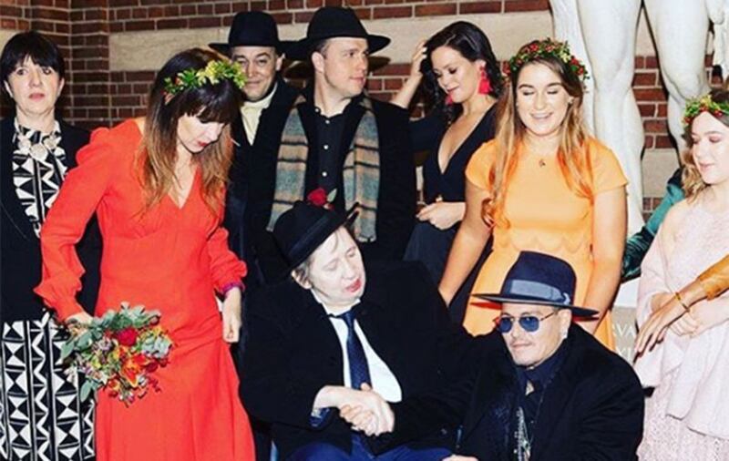 Shane MacGowan at his wedding to Victoria Mary Clarke (red dress.) Their friend Johnny Depp played guitar at the ceremony