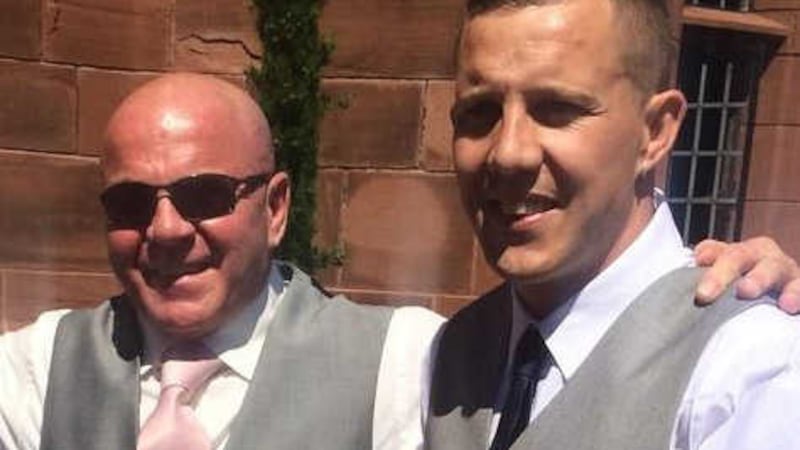 Jonathan Adair pictured with his father, former UDA boss Johnny, at a family wedding last September&nbsp;