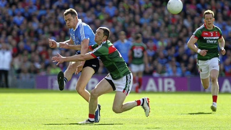 Dublin&#39;s Dean Rock comes under pressure from Mayo&#39;s Keith Higgins in the All-Ireland Senior Football final at Croke Park, Dublin on September 17 2017. Picture: Seamus Loughran. 