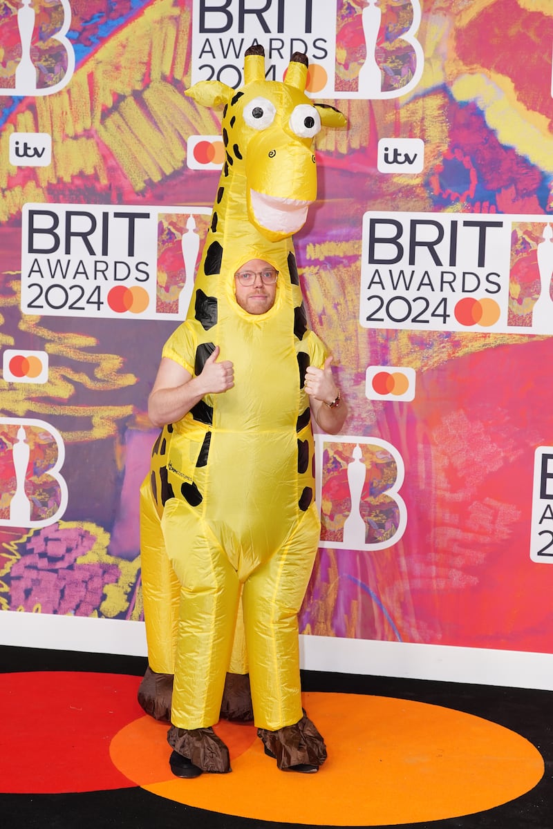 Rob Beckett attending the Brit Awards 2024 in his giraffe costume