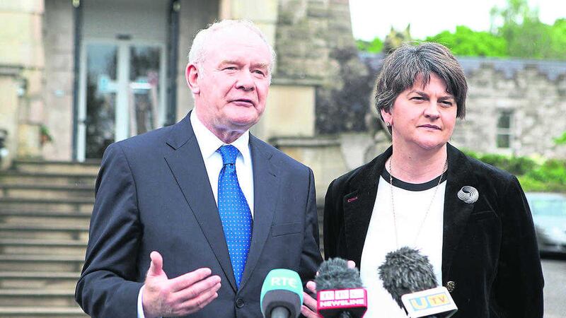 Deputy First Minister Martin McGuinness outside Stormont Castle with First Minister Arlene Foster. Picture Matt Bohill..