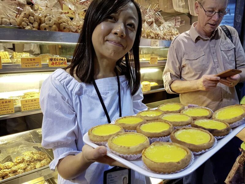 Yammy offers custard tarts at Hei Lee Cake Shop 