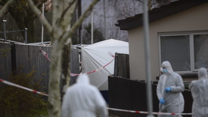 Forensics officers at work in Lurgan's Edward Street area on Sunday. Picture: Mark Marlow