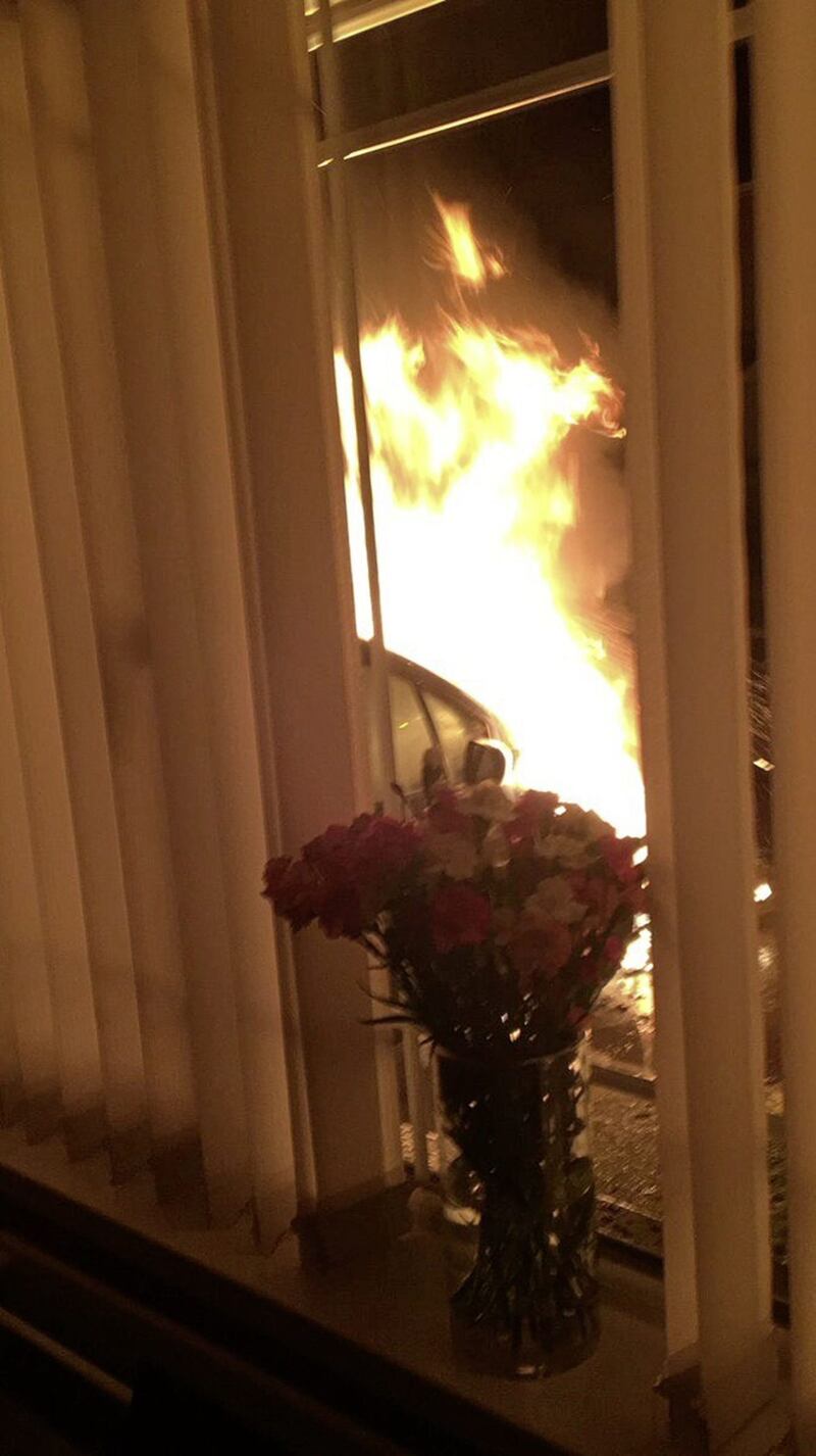 A view of the fire which engulfed Kevin Campbell&#39;s car outside his home in Derry. Picture from Twitter/Derry Sinn F&eacute;in 