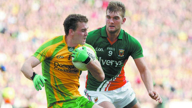 Pictured during the 2012 All-Ireland final against Mayo, Eamon McGee holds off Aidan O&#39;Shea 