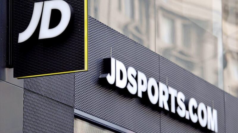 Sportswear giant JD Sports posted a fall in its pre-tax profits to &pound;298.3m for the first half of the year - down from &pound;364.6m a year ago 