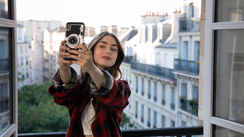 The show stars Lily Collins as an American in the French city.