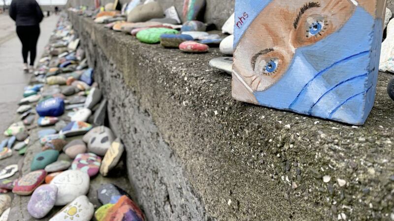 Thousands of hand painted pebbles of love,hope and Thanks are put around the harbour at Donaghadeeduring the year of the Covid 19 Pandemic.Picture by Hugh Russell. 