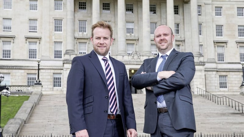 Rainbow Communications has inked a major multi-year deal with the Northern Ireland Civil Service (NICS) to upgrade and maintain crucial telephony communications networks across 185 locations. Pictured outside Parliament Buildings are Stuart Carson, sales director at Rainbow Communications and Philip McCauley, head of telecommunications for the Northern Ireland Civil Service 