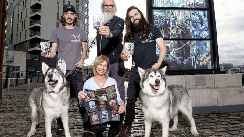 Follow the trail: Game of Thrones Direwolves Thor (Greywind) and Odin (Summer) pictured with owners William and Caelan Mulhall of Direwolf Tours and Flip Robinson of Giant Tours Ireland who was a stand-in for Hodor and The Mountain in the world&rsquo;s biggest TV show, helped Tourism NI&rsquo;s Judith Webb launch a new visitor guide spotlighting the Glass of Thrones Trail in Belfast. Picture by William Cherry 