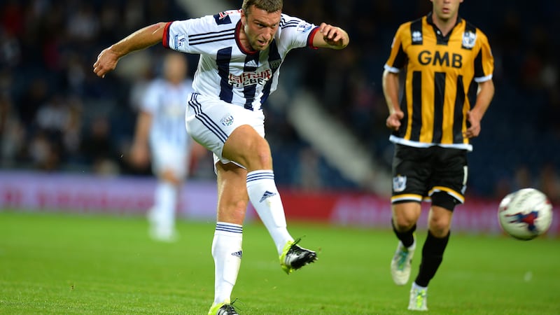 West Brom's Rickie Lambert has a shot on goal during Tuesday night's Capital One Cup tie with Port Vale<br />Picture: PA&nbsp;