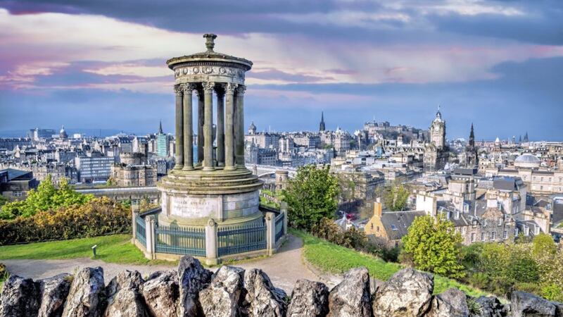&#39;The giddiness of being somewhere new propels us up Calton Hill. Shimmering grey, Edinburgh&#39;s Old and New Towns unravel below...&#39; 