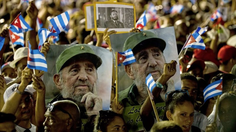 People wait for the start of a memorial honoring the late Fidel Castro at Plaza Antonio Maceo in Santiago, Cuba. Picture by Ramon Espinosa, Associated Press