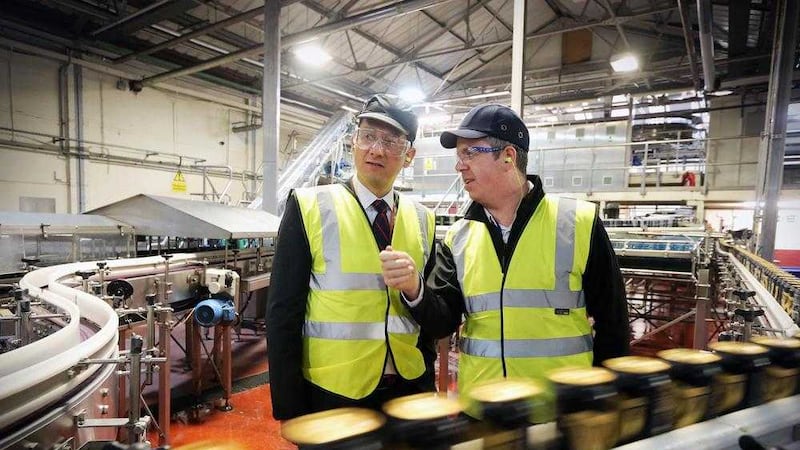 Jorges Lopes, country director Diageo on site with Gary Simpson, production manager at Diageo&#39;s east Belfast facility 