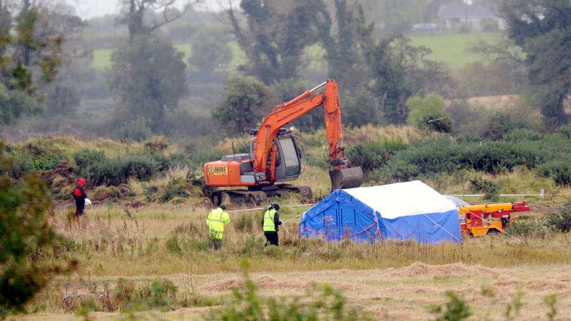 Detectives investigating the murder of Lisa Dorrian search an area of farmland near Comber, County Down in 2012 