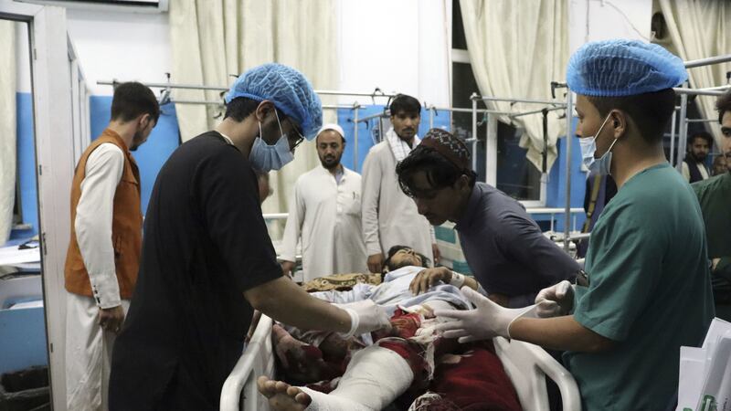 A victim receives medical assistance in a hospital after he was wounded in the deadly attacks outside the airport in Kabul, Afghanistan, Thursday, August 26, 2021 (AP Photo/Khwaja Tawfiq Sediqi)&nbsp;