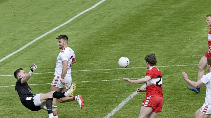 Tyrone keeper Niall Morgan blocks the goal effort by Jason Rocks of Derry during the opening minutes of the 2019 Ulster Senior Football Championship match at Healy Park, Omagh. Picture by Margaret McLaughlin. 