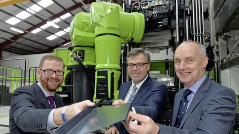 Announcing the R&amp;D investment, from left, economy minister Simon Hamilton, Alastair Hamilton, Invest NI and Jim Erskine, CCP Gransden 