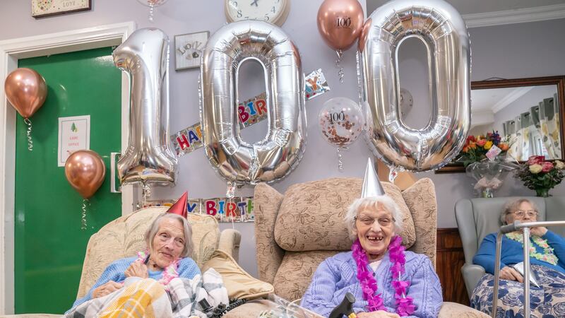 Twins Florence Boycott and Anne Brown, celebrate their 100th birthday in Barnsley, South Yorkshire hire (Danny Lawson/PA)