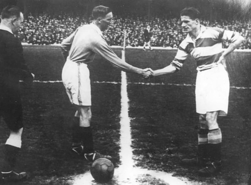 BIG TWO: Belfast Celtic captain Jimmy McAlinden (right) takes the toss with his Linfield counterpart prior to the 1944 Irish Cup final at Windsor Park. Celtic won the game 3-1, goals coming from McAlinden, Paddy Bonnar and Artie Kelly. The Belfast Celtic team that day was: H Kelly, McMillen, Cullen, Walker, Vernon, O'Connor, Collins, McAlinden, Byrne, A Kelly, Bonnar&nbsp;