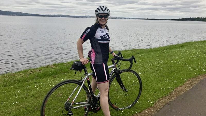Rugby player Grace Davitt cycling near Carrickfergus 