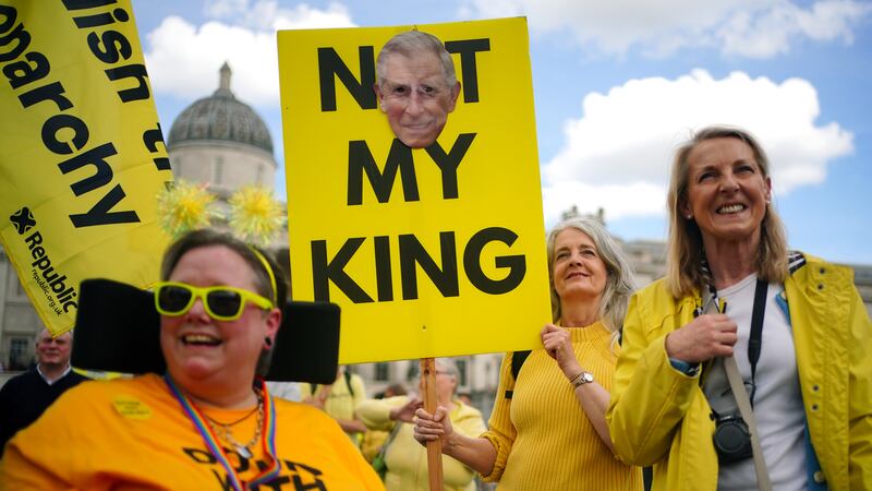 People take part in a rally by anti-monarchy pressure group Republic in Trafalgar Square