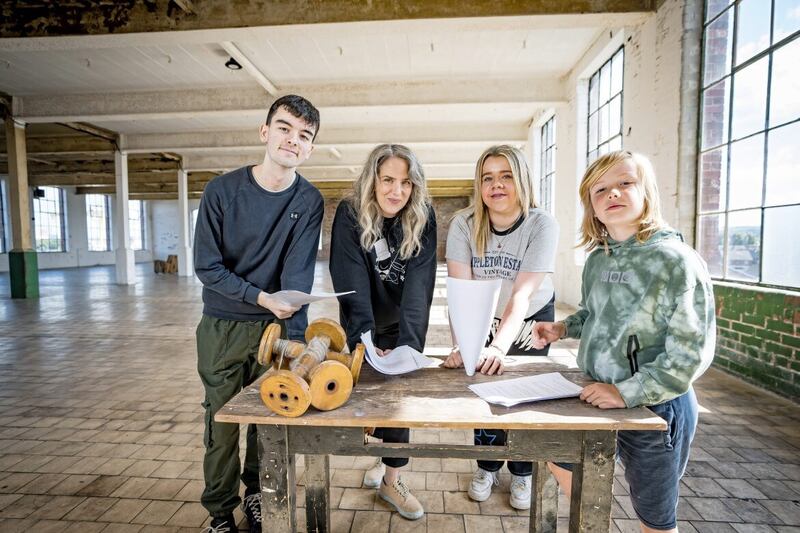 Rachael Carnegie (second left) pictured with some of those who helped put out the call for young people to take part in Centre Stage&#39;s upcoming production of Half Timers at the Portview Trade Centre. Pictured with Rachael are Ruair&iacute; McClean (left), Evvie Bishop and Finn Harriott 