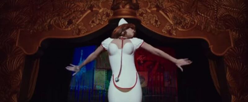 Rihanna transforms into a white outfit in the trailer (Lionsgate)