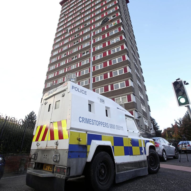 Police at the scene at Divis Tower in west Belfast where James Hughes (62) was found dead in his flat. Picture by Mal McCann. 