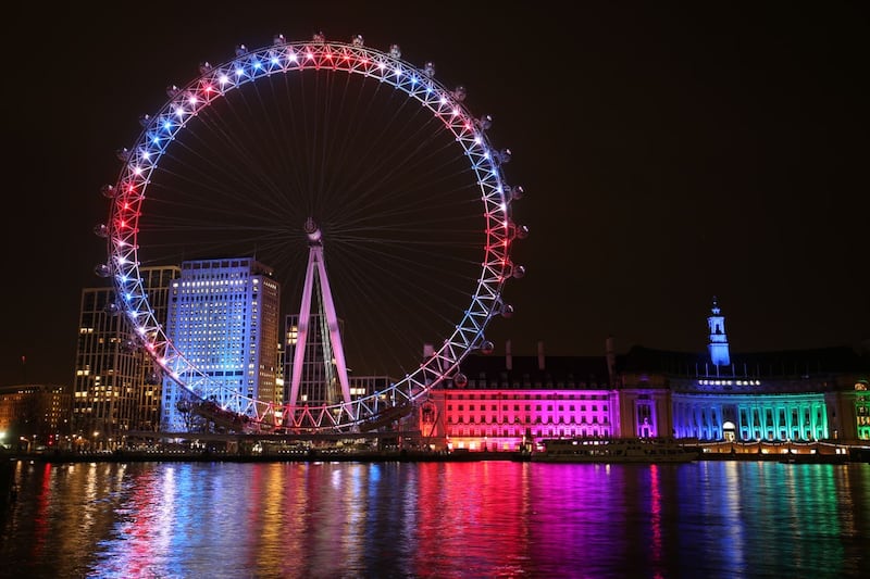 The London Eye and buildings along the South Bank were lit up with the colours of the Union flag during a nationwide clap in honour of Captain Sir Tom Moore
