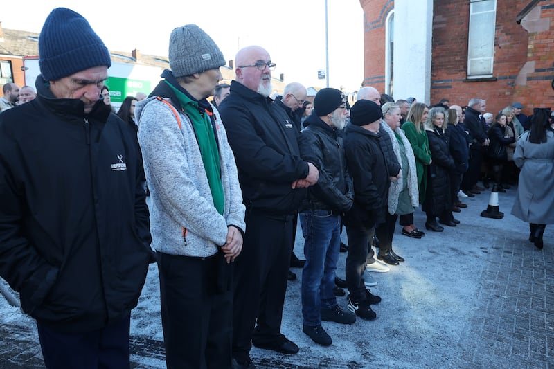 The Funeral of  "superhero volunteer" Alex Duffy arrives at Sacred Heart Church on the Oldpark Road as the Peoples Kitchen and New Lodge Youth Club form a guard of honor. PICTURE: MAL MCCANN