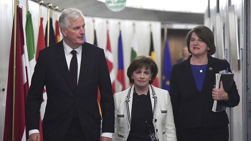 European Union Chief Brexit negotiator Michel Barnier (left) arrives with DUP leader Arlene Foster, right, and DUP European Parliament member Diane Dodds for their meeting at the European Commission headquarters in Brussels&nbsp;