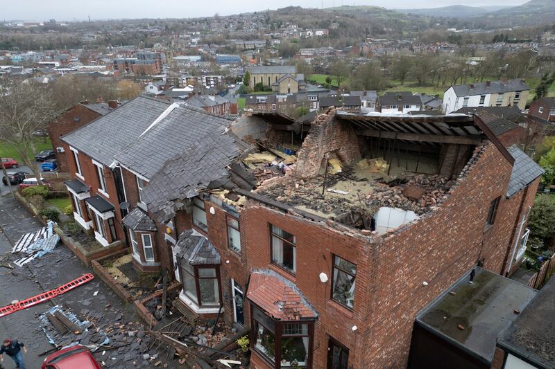 The ‘localised tornado’ ripped off roofs and brought down walls (AP Photo/Jon Super)