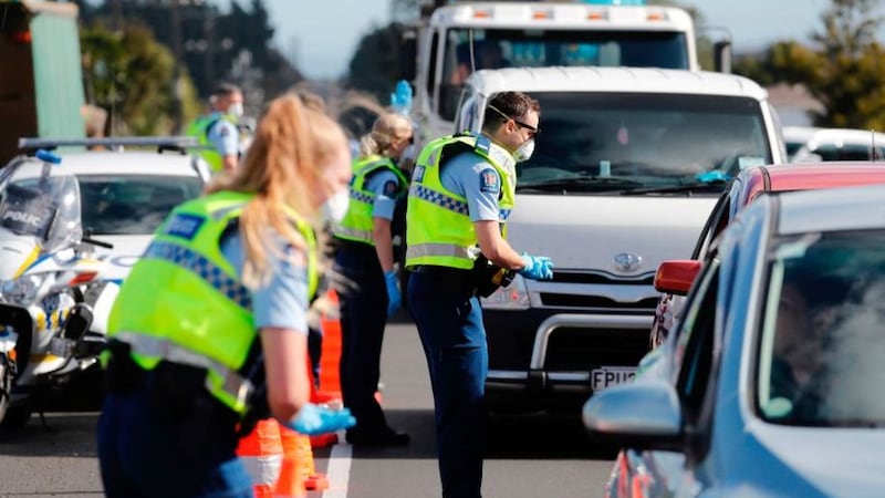 &nbsp;Police man a road block on the outskirts of Auckland as New Zealand's largest city moved to Covid-19 alert level 3 on August 12 2020. Picture by&nbsp;Dean Purcell/New Zealand Herald via AP