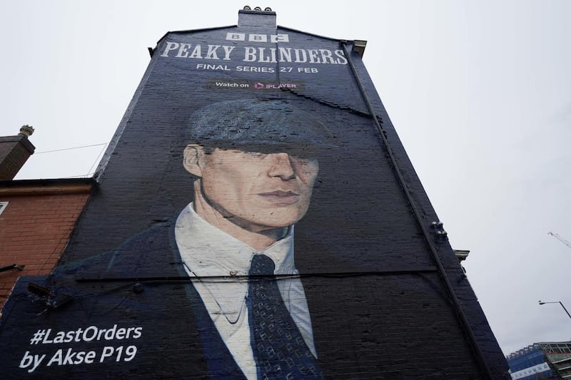 A mural by artist Akse P19 of actor Cillian Murphy as Peaky Blinders crime boss Tommy Shelby in the historic Deritend area of Birmingham