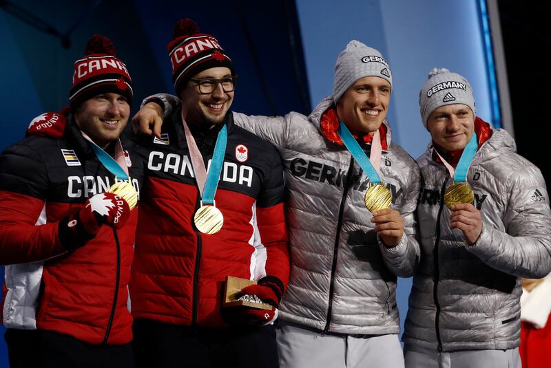 Germany and Canada share the gold medal in the two-man bobsled event at the 2018 Winter Olympics in Pyeongchang