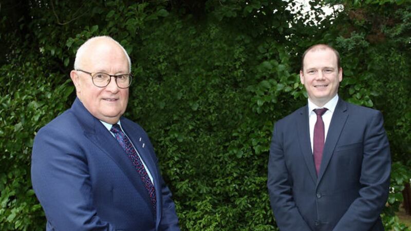 Economy Minister Gordon Lyons with Sir Michael Lyons who will lead an independent review of the work of Invest NI&nbsp;