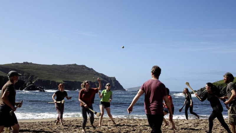 Hurling on Clogher Beach on the Dingle Peninsula in Co Kerry during a D&iacute;seart Gaelach Fi&aacute;in retreat  